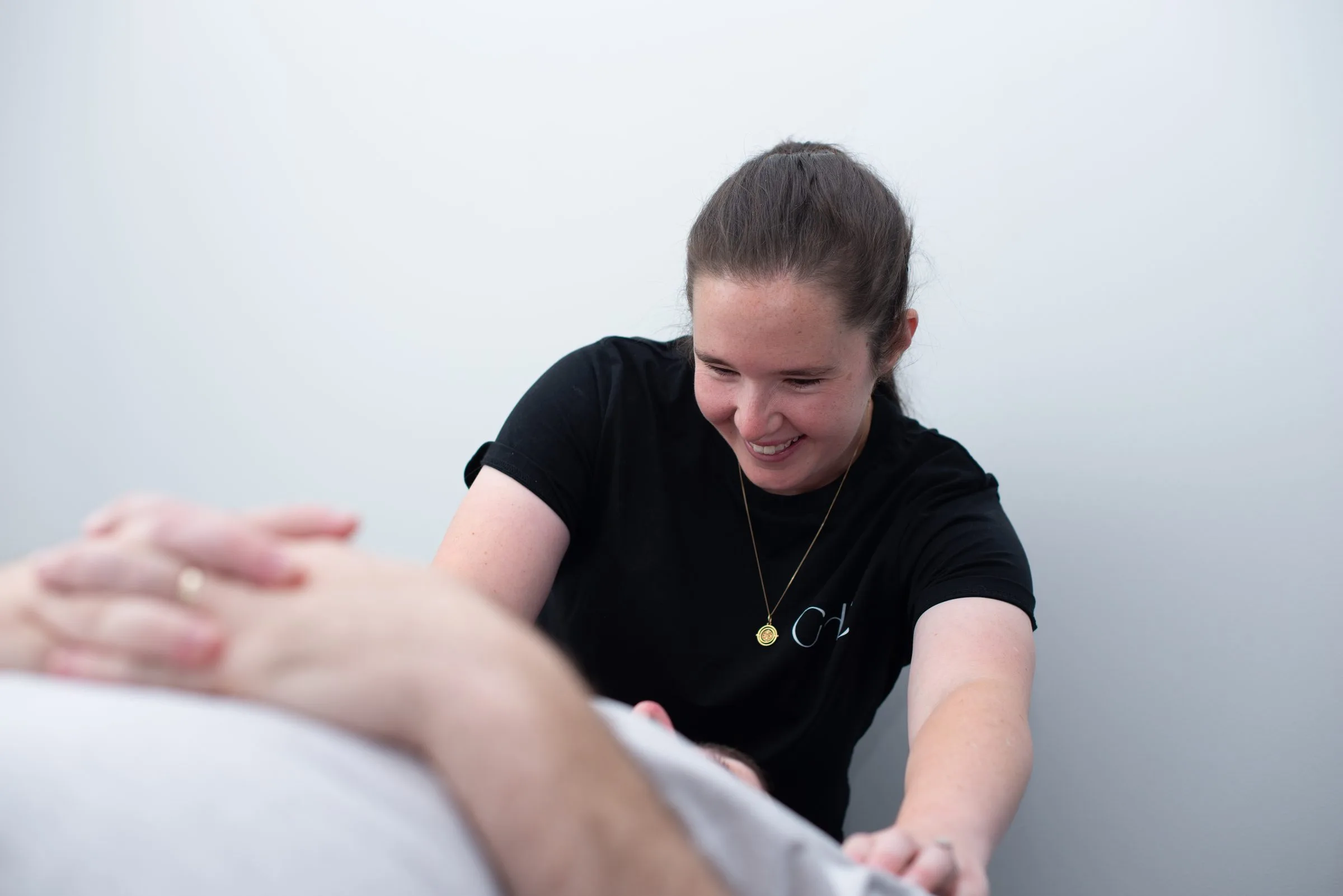 Occupational therapist supporting a client through a session