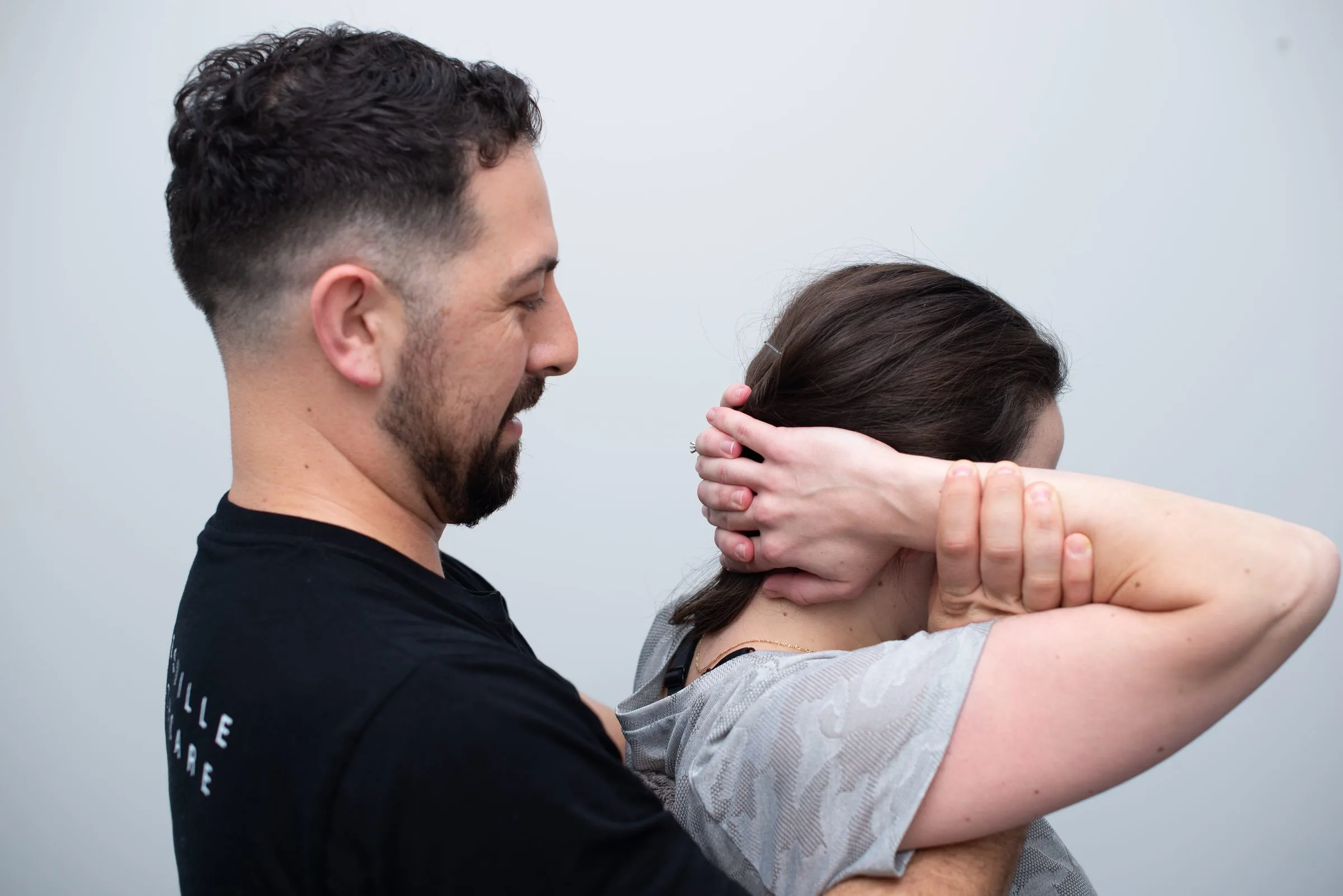 Chiropractor treating a patient at Gladesville Healthcare