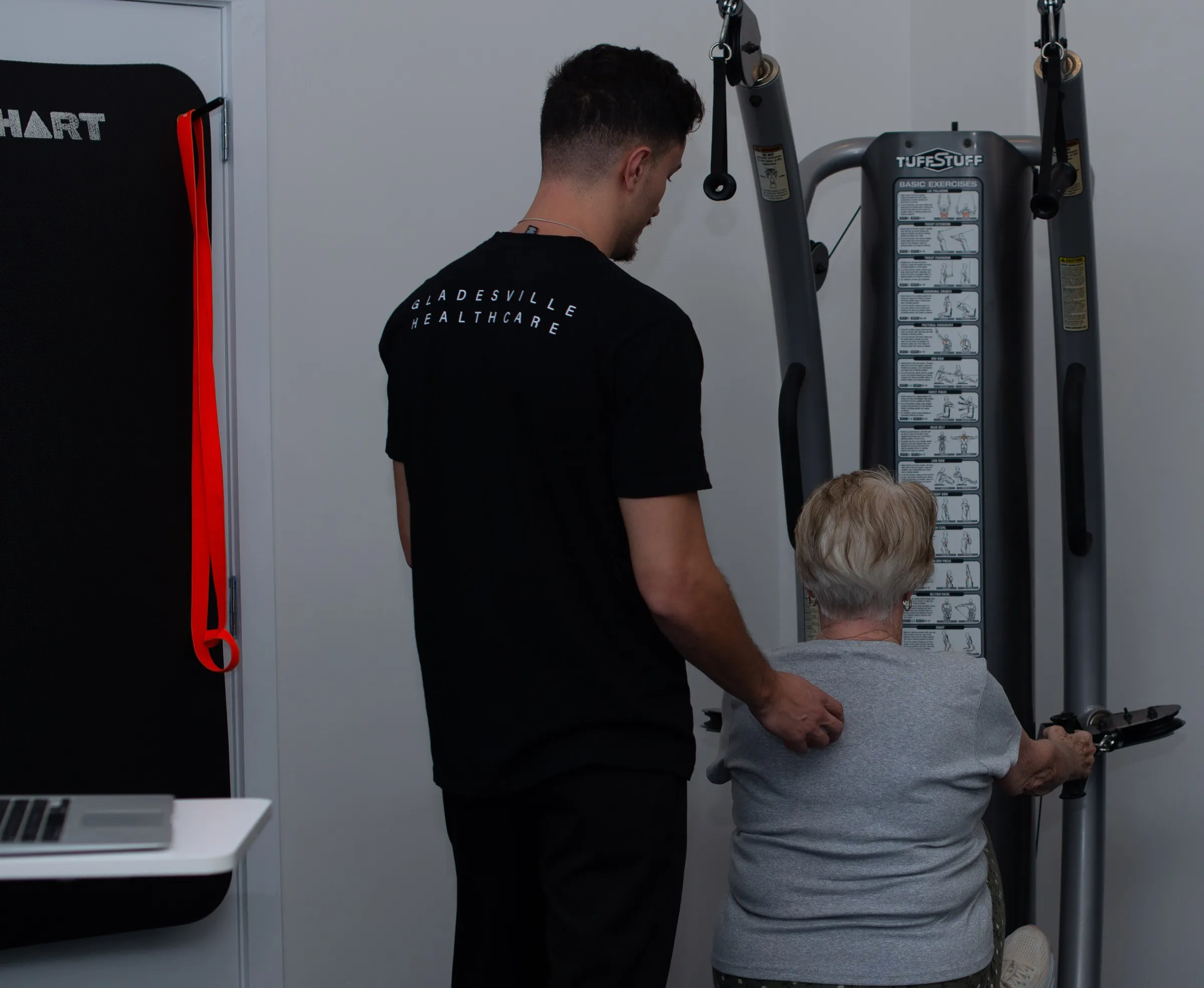 Patient doing a guided exercise with a practitioner at Gladesville Healthcare
